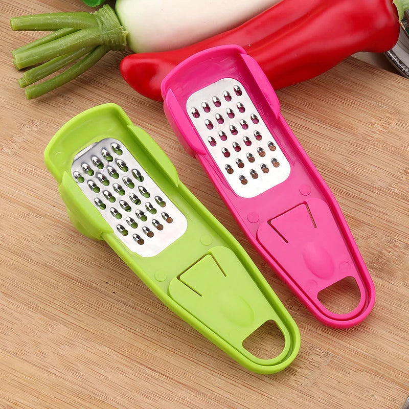 Eco-friendly garlic masher and seasoning grinder in rose red and light green