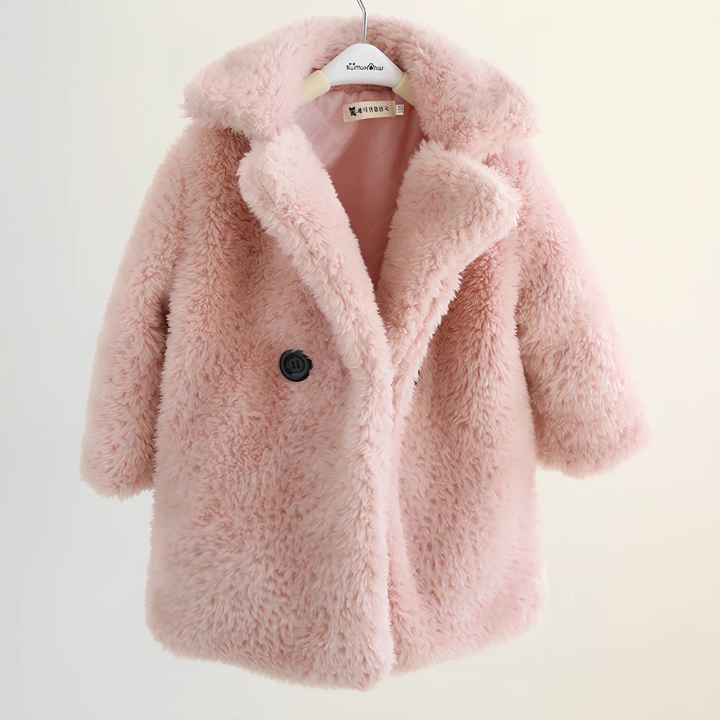 Children's cashmere fur coat in beige colour with suit collar and long sleeves for winter wear
