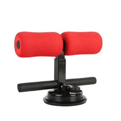 Sit-up auxiliary abdominal muscle clamp in black with foam padding on a floor