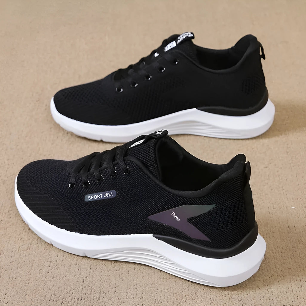 Low-top women's casual running shoes in beige with mesh upper, round toe, and front lace-up closure