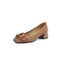 Women's light brown leather hollow weave pumps with an oversleeve design and a mid-height heel.