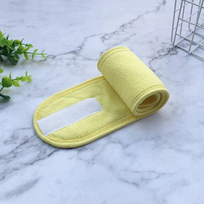 Soft polyester beauty headband for hair control during makeup, sports, and yoga.