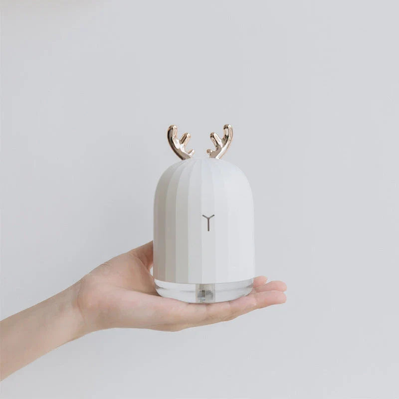 Compact USB-powered humidifier in a cute deer-shaped design for use in small rooms and offices