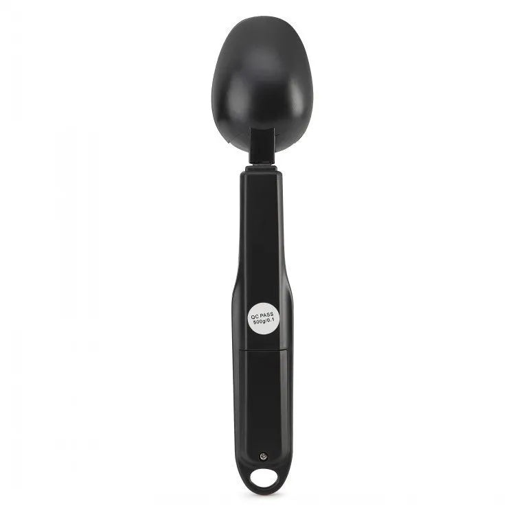 Smart digital kitchen measuring spoon with backlit LCD display showing weight and volume measurements.