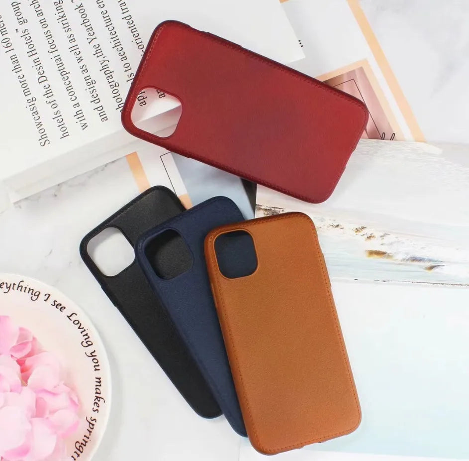 Leather iPhone case with card slot in black, brown, navy blue and wine red colours