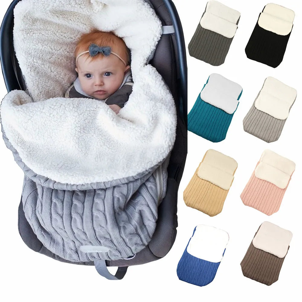 Envelope-style baby stroller sleeping bag in a choice of colours, shown with cotton wool filling and lamb cashmere lining.