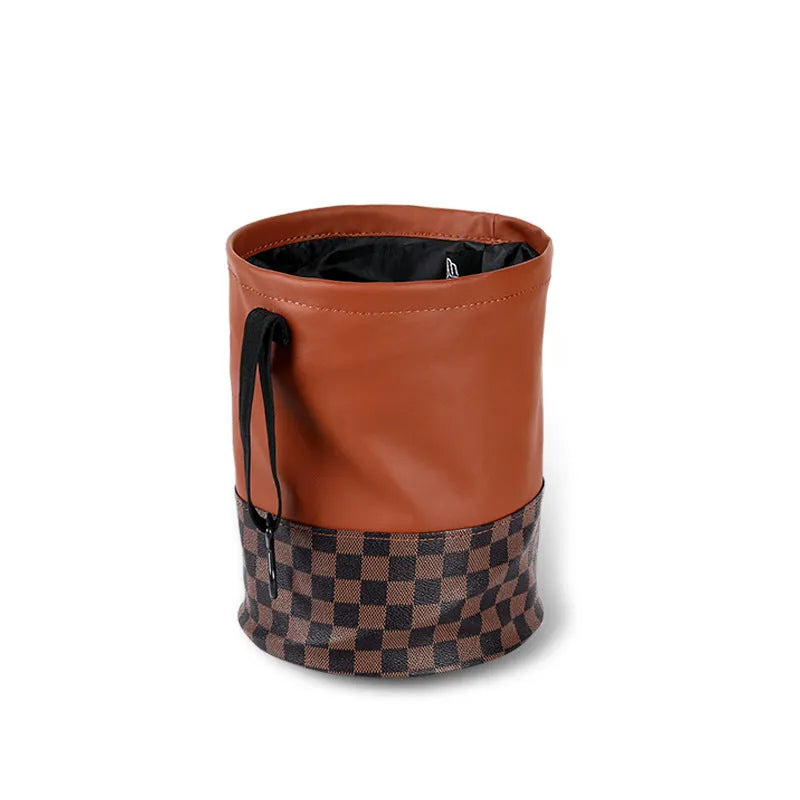 Black retractable leather car rubbish bin with carry handle, shown in folded and expanded states.