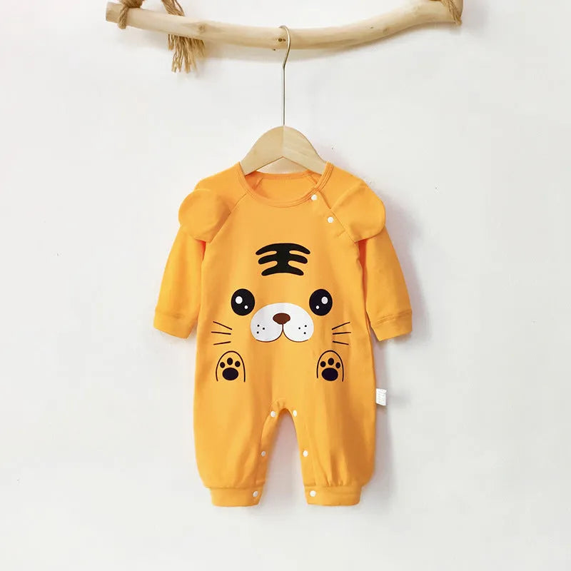 Cotton long sleeve baby jumpsuit in size 73cm with fun print, neutral unisex design for spring autumn