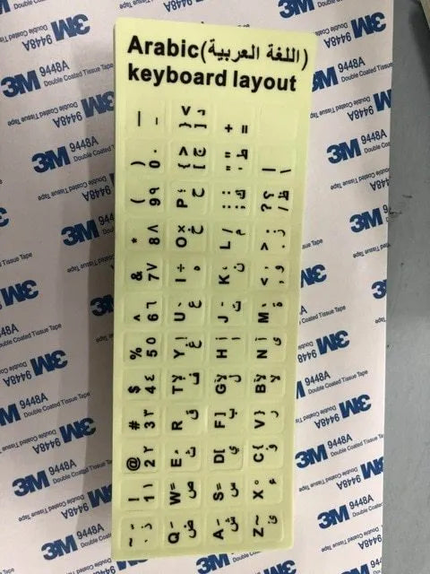 Yellow PVC keyboard stickers with glowing multilingual characters for desktop and laptop computers