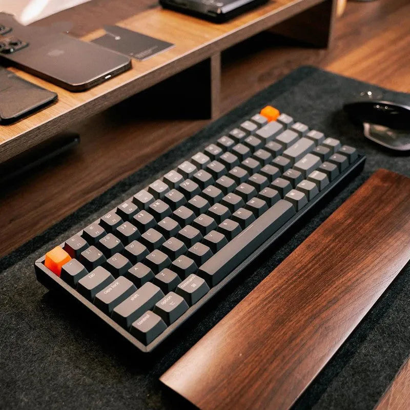 Grey 87-key mechanical keyboard with white backlight, USB and Bluetooth connectivity, compact plastic edge design