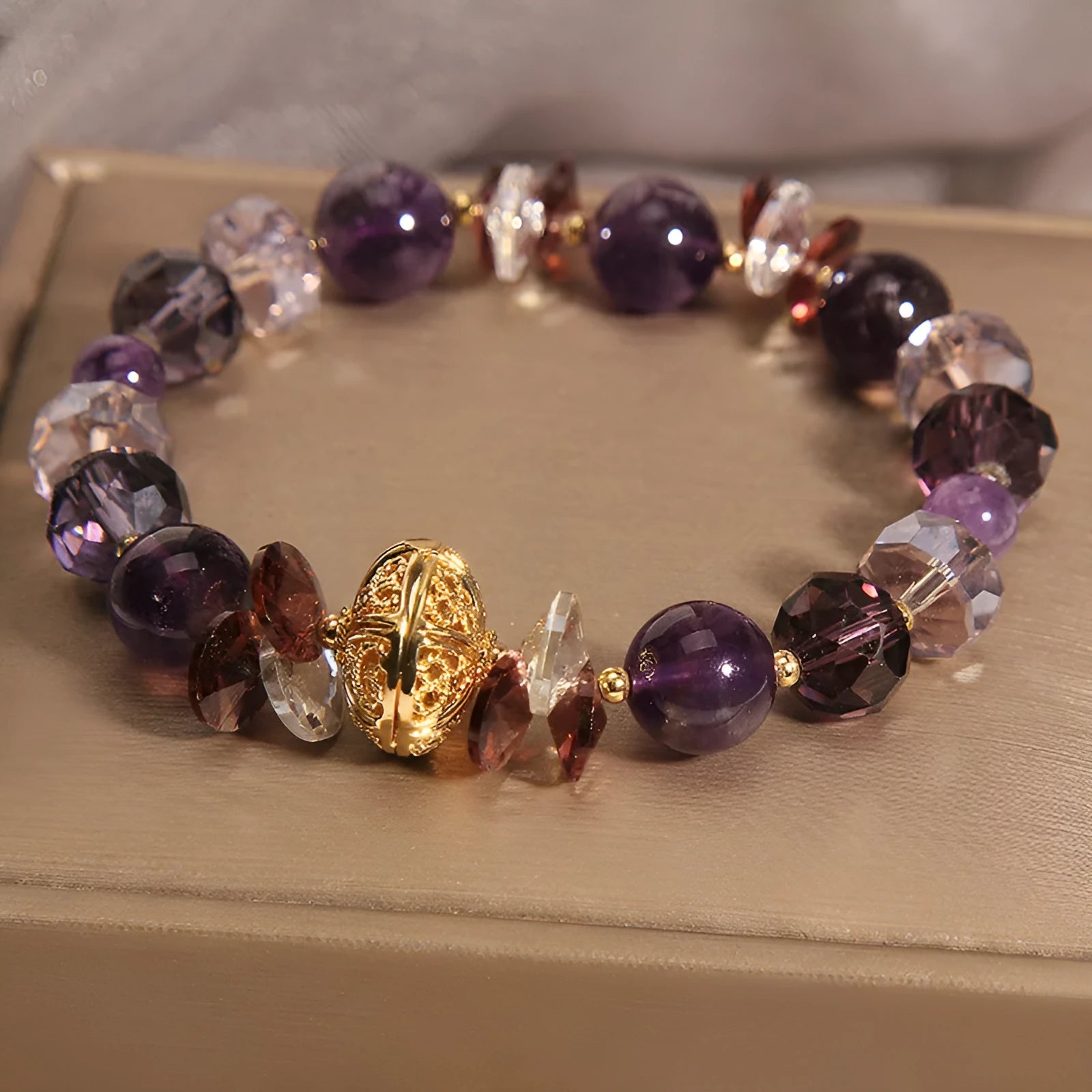Purple crystal bracelet with pumpkin lucky beads and rhinestone wind chimes design for women.