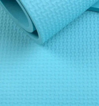 EVA yoga mat in blue showing 6mm thickness and textured anti-skid surface.