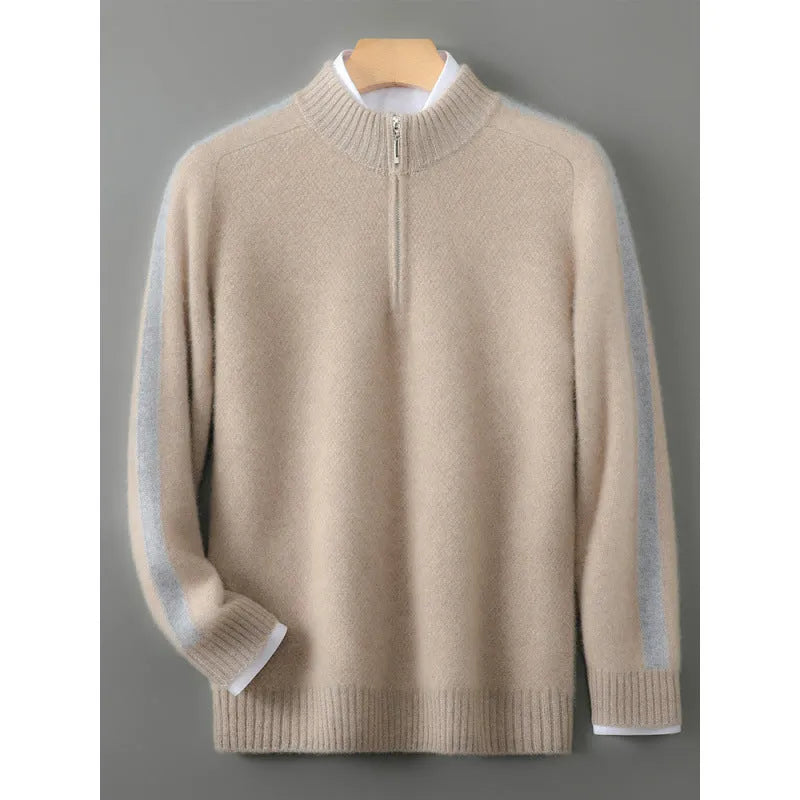 Plus-size model wearing a slim-fit, grey, half-zip wool sweater with a round neckline.