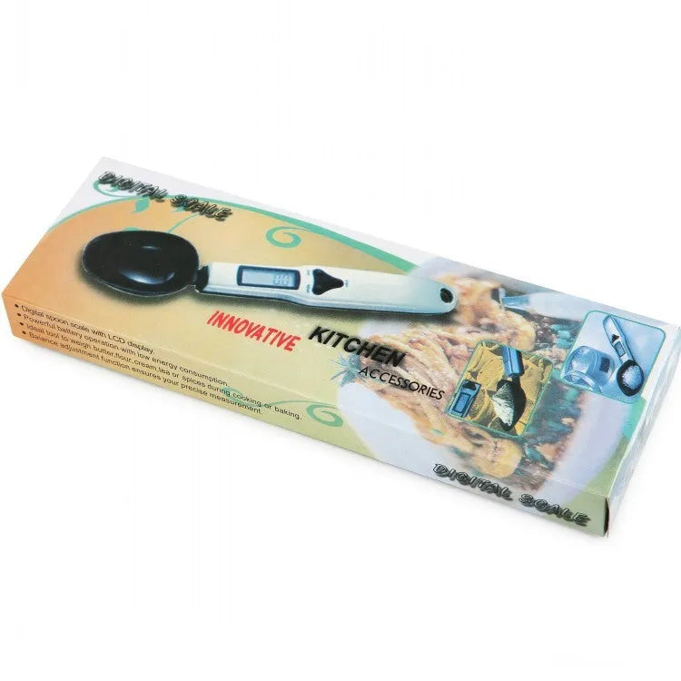 Smart digital kitchen measuring spoon with backlit LCD display showing weight and volume measurements.