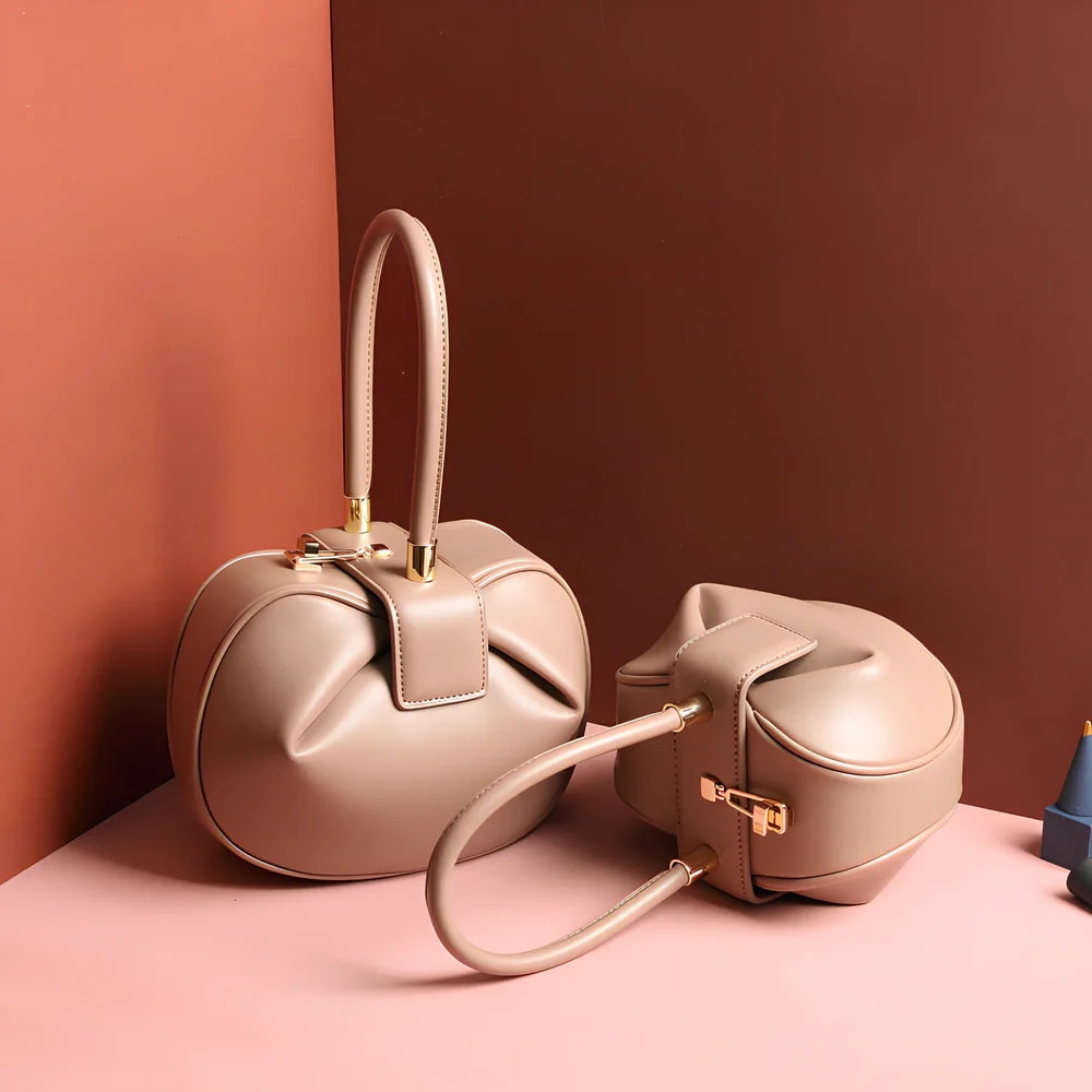 Women's cowhide leather tote bag in tramp shape with single handle and buckle, available in apricot, black, and other colours, big size 35cm x 40cm