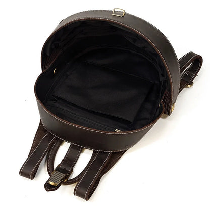 Vintage leather backpack in dark brown and black with multiple pockets