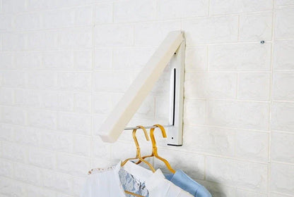 Folding clothes rack with minimalist design for saving space in small rooms and apartments