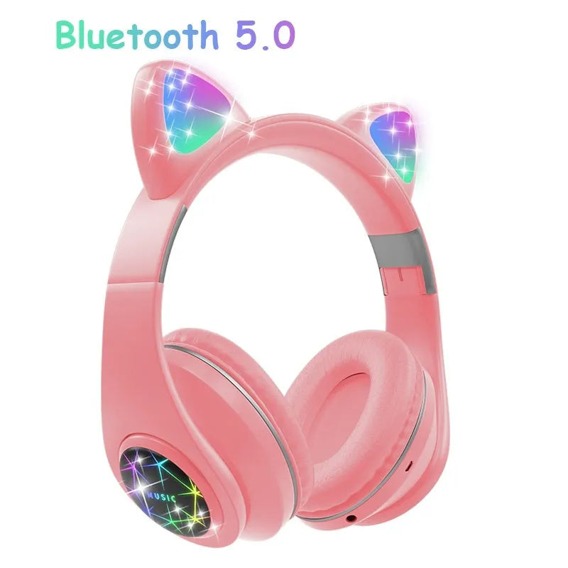 Cat ear design wireless Bluetooth headphones shown in multiple colours including pink, black, and blue.