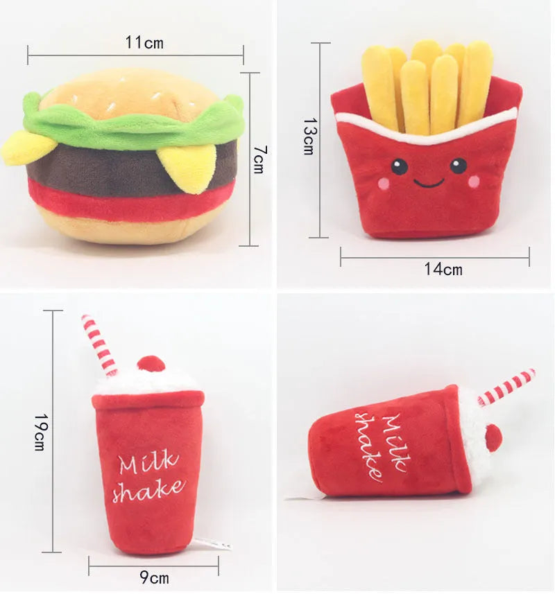 A selection of soft plush pet toys in hamburger, french fries, and milkshake cup designs.
