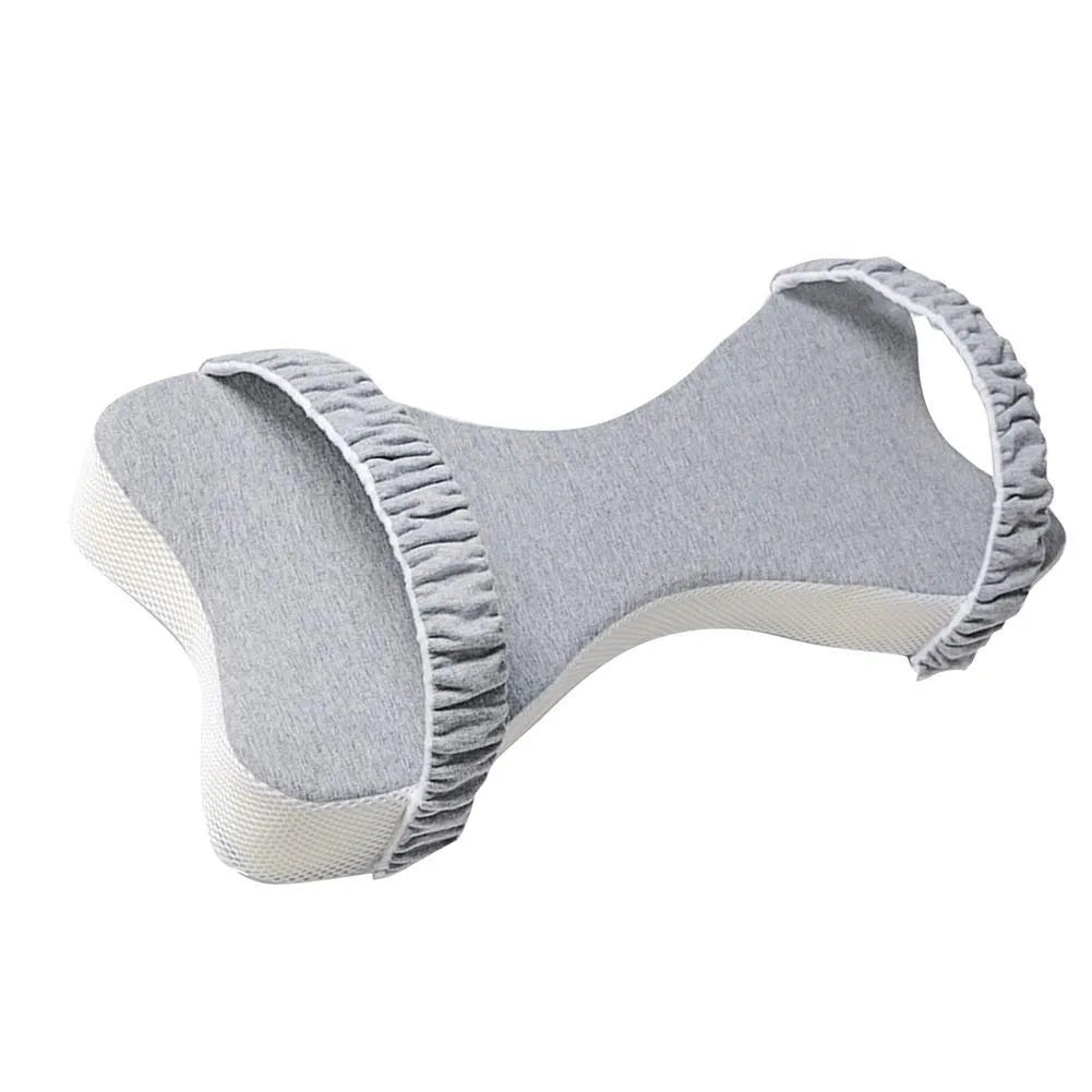 Memory cotton knee pillow in light blue on a bed, size 70x37x9cm for side sleeping support