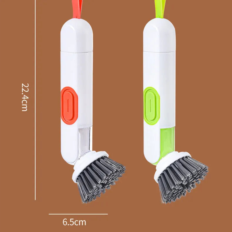 White and red long-handle kitchen cleaning brush with integrated soap dispenser button and two brush heads.