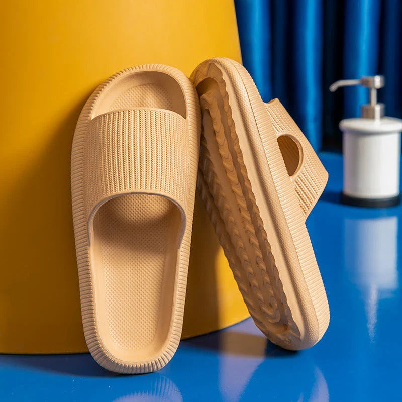 Stylish and comfortable EVA bathroom slippers with soft cushioned soles and anti-slip design, available in a variety of vibrant colors.