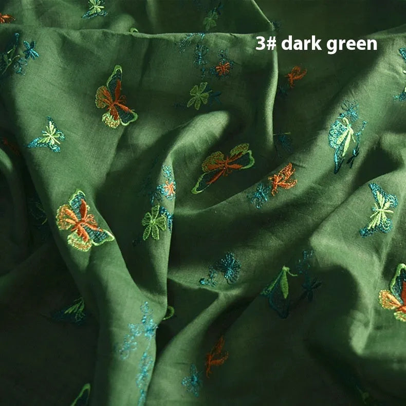 Pure ramie embroidery cloth fabric for hanfu, shown in beige, grass green, and dark green colours.