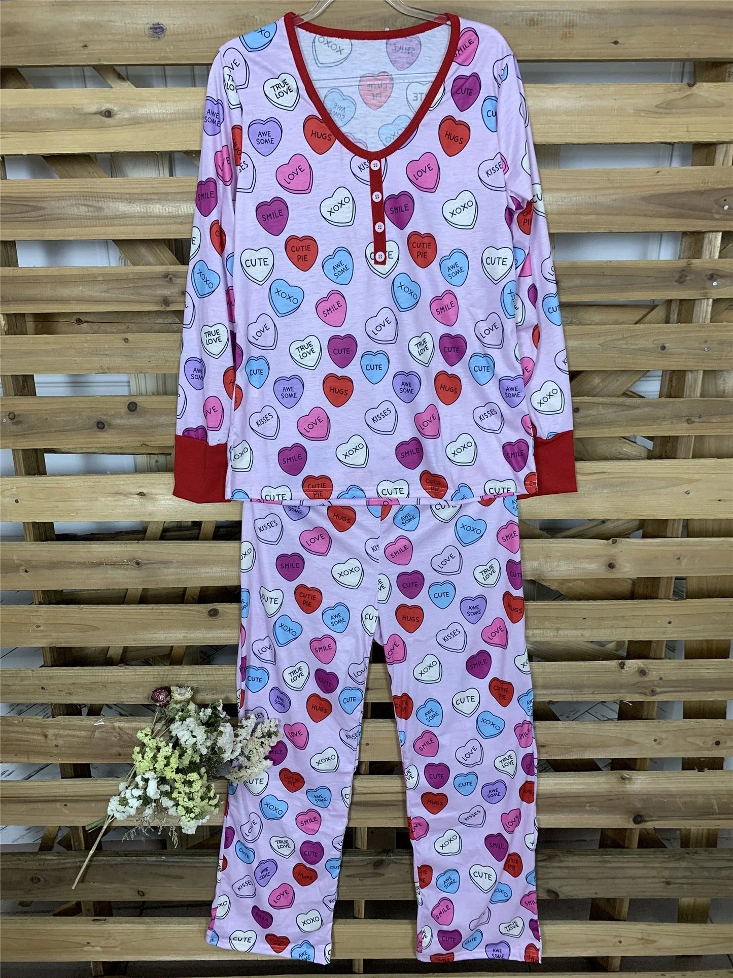 Valentines Day family pajamas with a cozy heart print design for parents and children