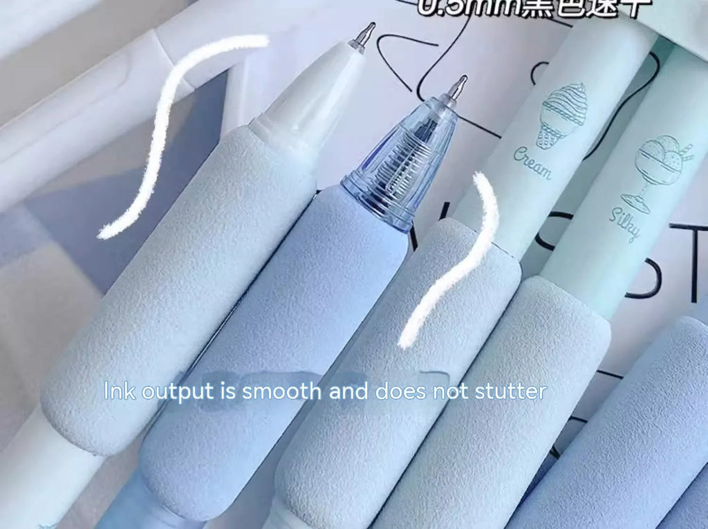 Set of four double-headed fluorescent pens for student calligraphy practice on a desk.