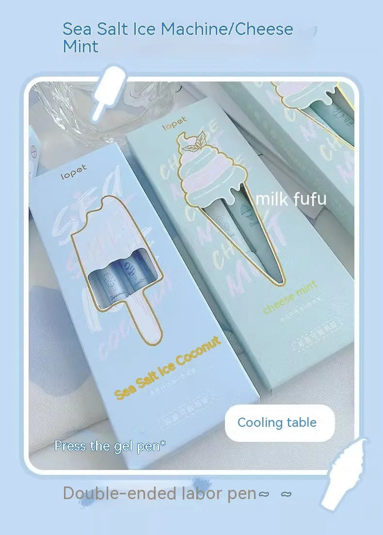 Set of four double-headed fluorescent pens for student calligraphy practice on a desk.