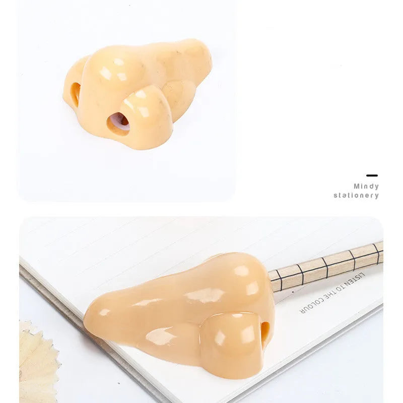 Flesh-coloured geometry-shaped plastic pencil sharpener with big nostril for standard pencils.