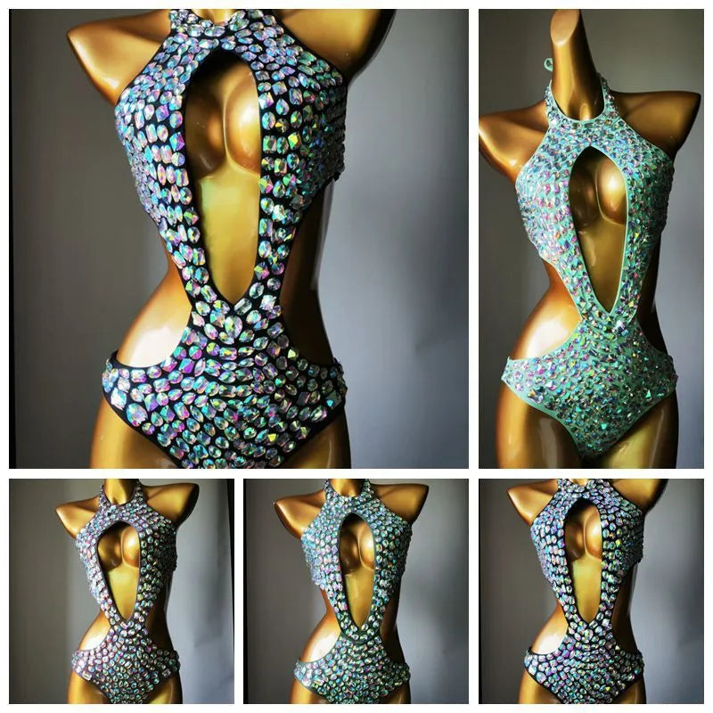 Women's black one-piece swimsuit with a mesh diamond pattern detail on the front.