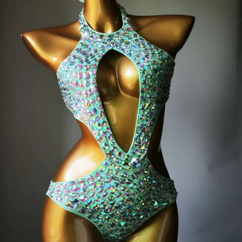 Women's black one-piece swimsuit with a mesh diamond pattern detail on the front.