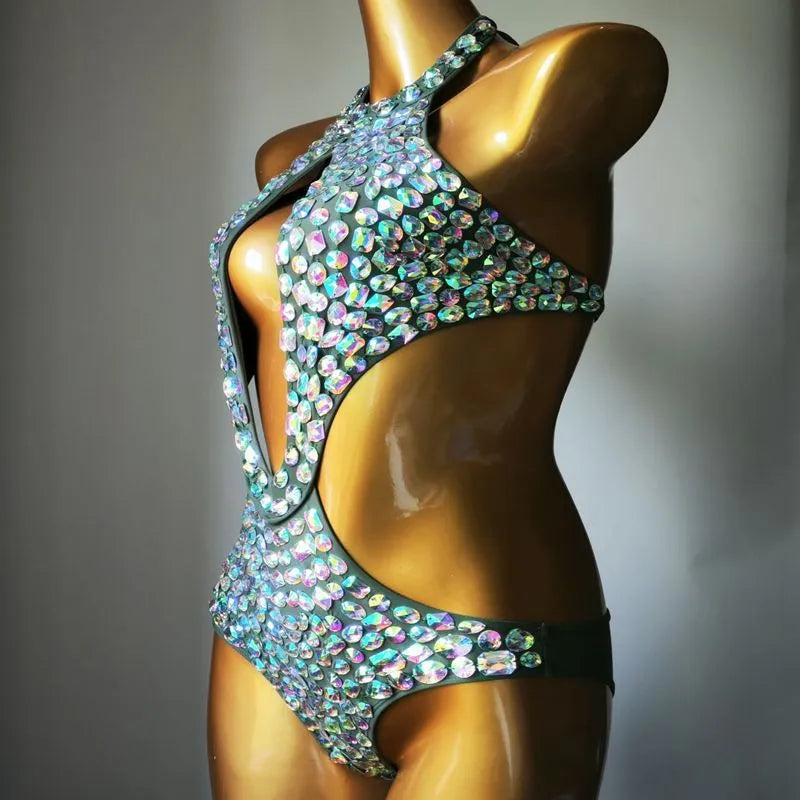 Women's black one-piece swimsuit with a mesh diamond pattern detail on the front.