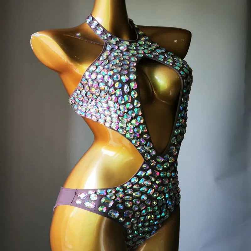 Women's black one-piece swimsuit with a mesh diamond pattern detail on the front.