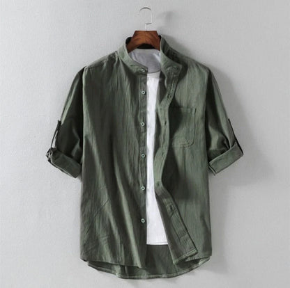 Men's linen stand collar loose shirt in white, black, and green with embossing detail