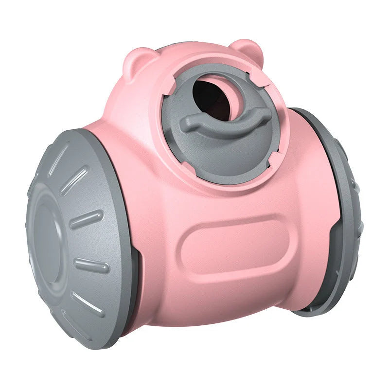 Interactive dog tumbler toy in red, green, and pink for IQ enhancement and slow feeding
