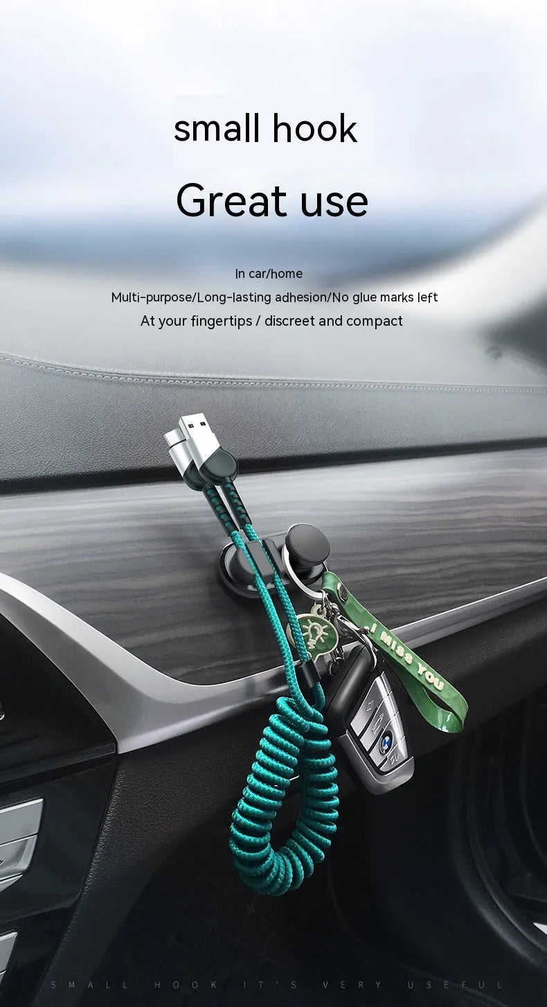 ABS silicone car and indoor cable storage hook in dark green measuring 52mm x 27mm