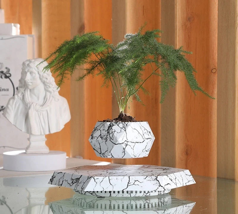 Levitating Plant Pot with marble design floating in air using magnetic technology