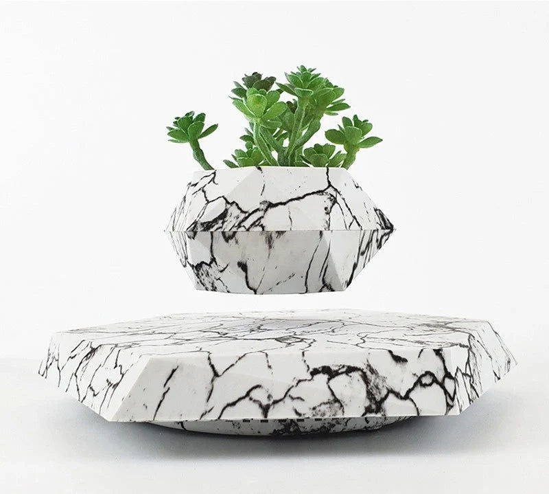 Levitating Plant Pot with marble design floating in air using magnetic technology