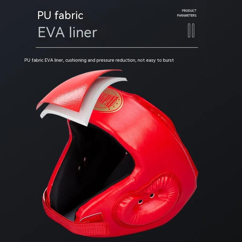 Fully enclosed red boxing helmet with jaw protection on a grey background.