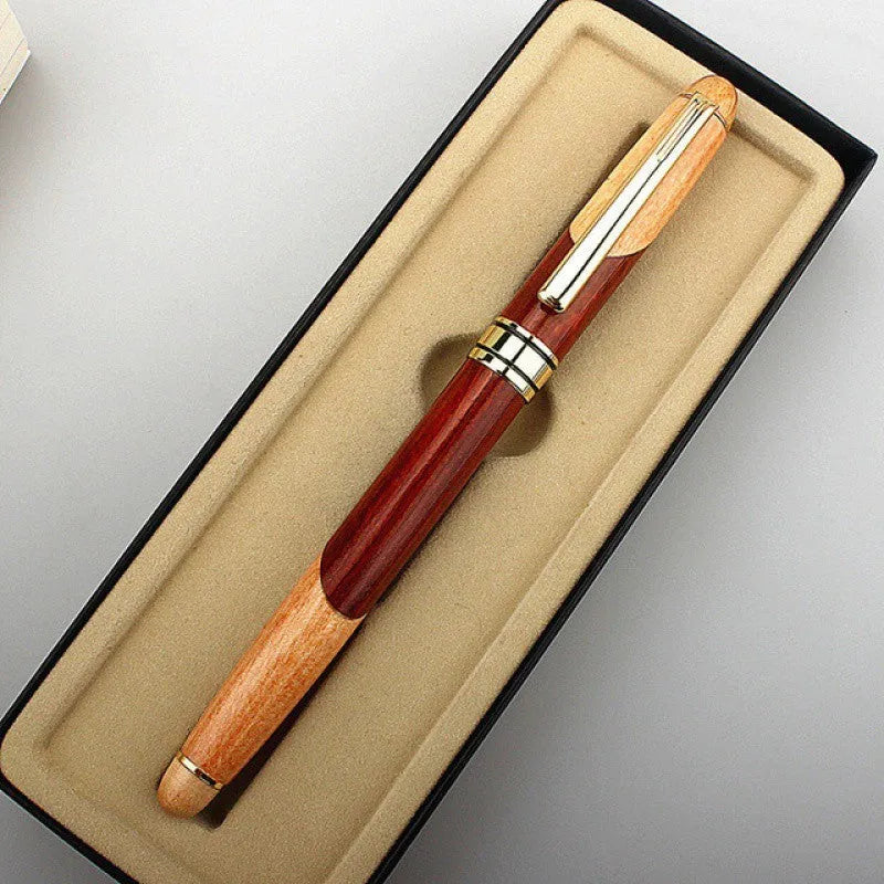 Wooden fountain pen with metal nib shown with a fabric protective pen bag