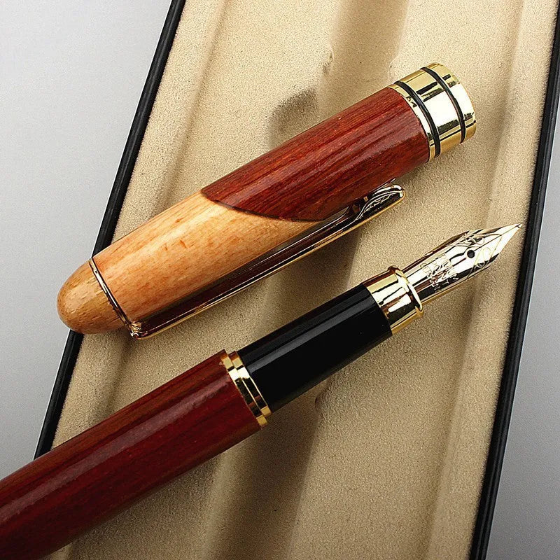 Wooden fountain pen with metal nib shown with a fabric protective pen bag