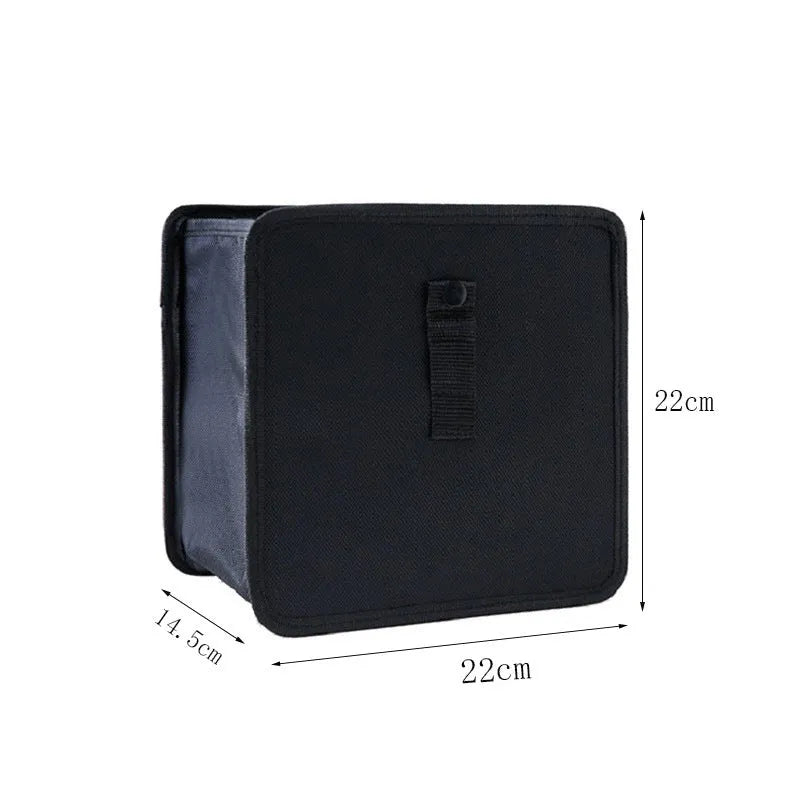 Black Oxford cloth car folding trash can showing expanded 22cm square shape and hanging strap