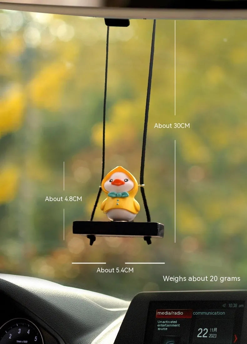 Yellow plastic duck doll car hanging ornament with four design variations for vehicle interior decoration