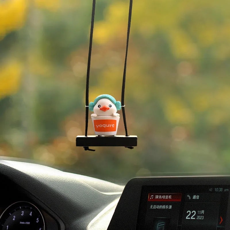 Yellow plastic duck doll car hanging ornament with four design variations for vehicle interior decoration