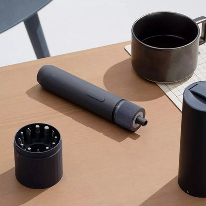 Compact cordless hand drill with LED light and rechargeable battery