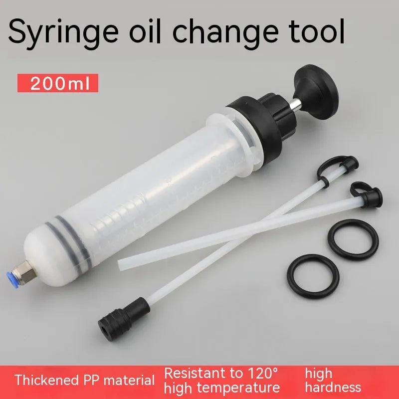 Manual pumping barrel oil change tool with dual suction injection capability
