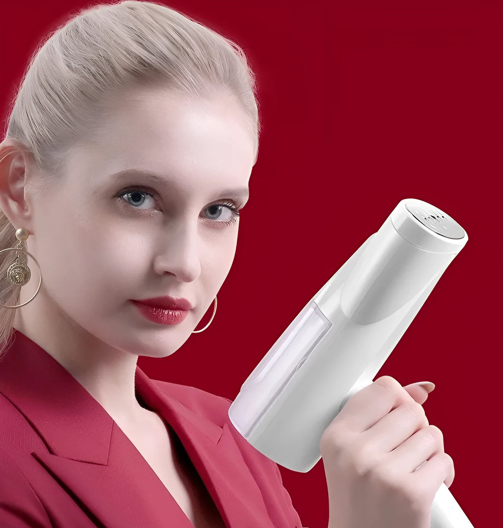 White folding ironing machine with 800W steam function, compact folded size 10cm by 6.2cm by 18cm, includes long hair brush