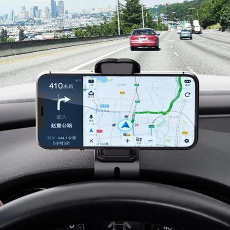 Black magnetic car phone holder with 360-degree rotation mounted on car vent